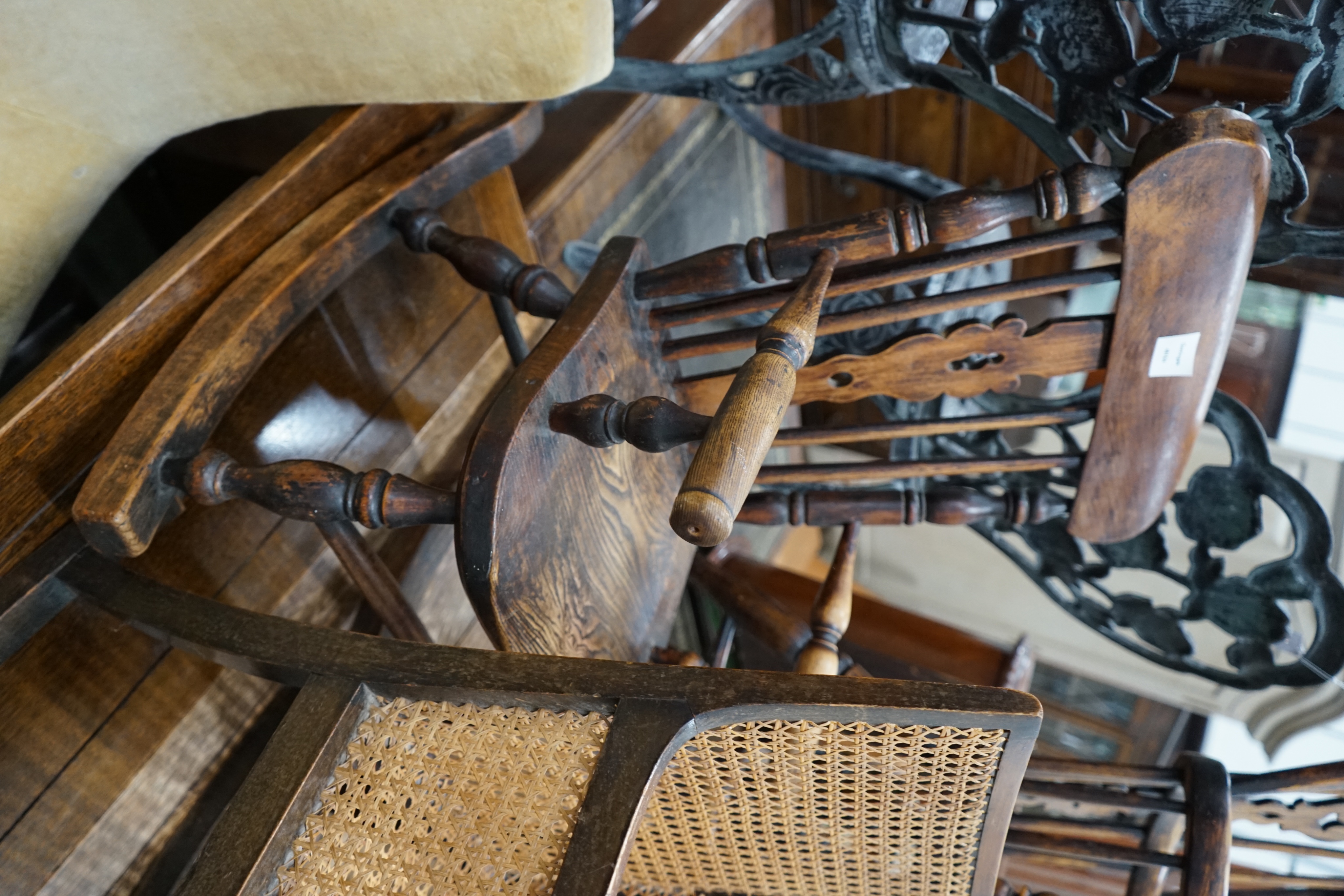 A Victorian elm and beech Windsor child's rocking chair, a Victorian style Windsor high chair and one other child's chair